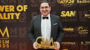 Karaca Ömer CEO Preis QM Foto Schmetterling